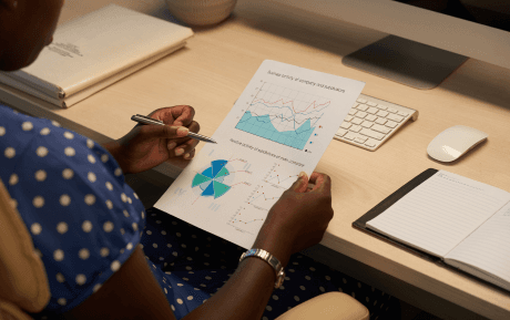 Team discussing financial planning charts and data