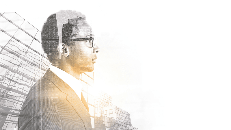 Business professional with double exposure cityscape